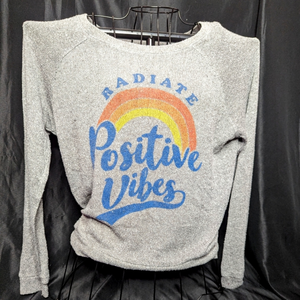 Woman's Color Bear positive vibes thin sweatshirt.